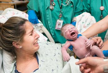 Powerful birth photos capture mothers’ raw emotions as they hold their babies for the first time