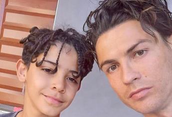 Cristiano Ronaldo’s son, Cristiano Jr is a total mini-me as he celebrates his 10th birthday by scoring a goal against his famous dad!